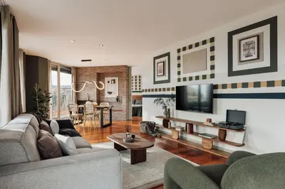 a bedroom with a large bed and a balcony at Misir - 2 bedrooms and terrace in Eixample Dreta in Barcelona