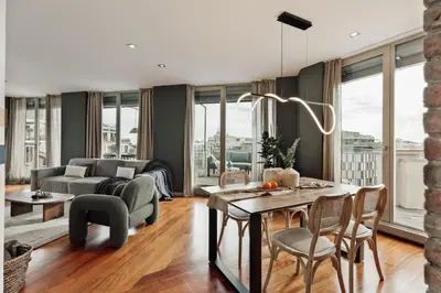 a kitchen with white cabinets and a sink at Misir - 2 bedrooms and terrace in Eixample Dreta in Barcelona