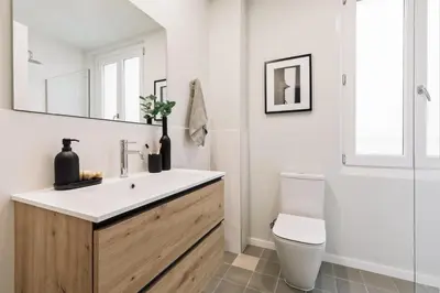a bathroom with a sink and a shower at Pacaya - 2 bedrooms, office and balcony in Eixample Dreta in Barcelona