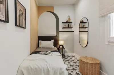 a bedroom with a large bed and a window at Adile - 4 bedrooms and balcony in El Putxet in Barcelona