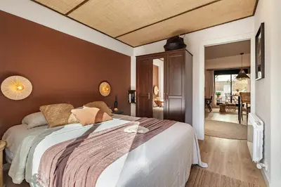 a bedroom with a large bed in a room at Batam - 1 bedroom and terrace in Gràcia in Barcelona