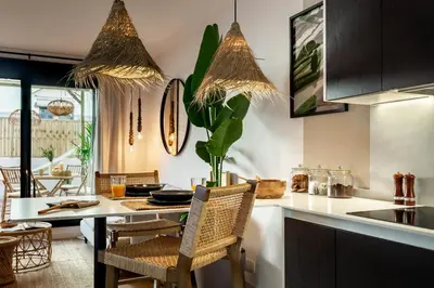 a living room with a couch and a table at Batam - 1 bedroom and terrace in Gràcia in Barcelona