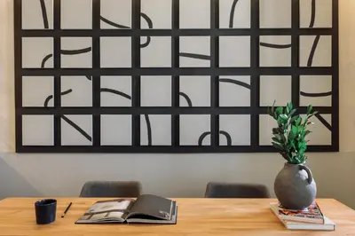 a living room with a tv and a table at Minchin - 1 bedroom, balcony and pool in Poblenou in Barcelona