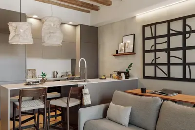 a living room with a couch and a table at Minchin - 1 bedroom, balcony and pool in Poblenou in Barcelona