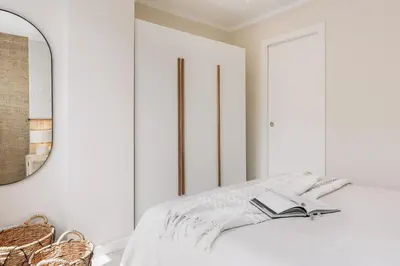 a bedroom with a bed with a book on it at Stabia - 2 bedrooms in Sant Gervasi in Barcelona