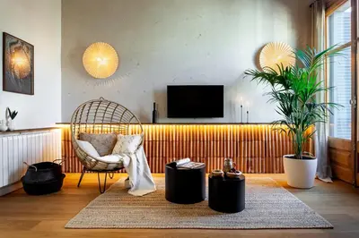 two chairs and a table on a balcony at Sumbawa - 2 bedrooms in Eixample Dreta in Barcelona