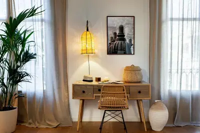 a dining room with a wooden table and chairs at Sumbawa - 2 bedrooms in Eixample Dreta in Barcelona