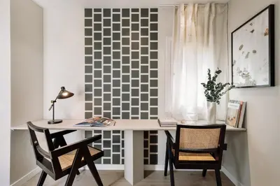 a kitchen with white cabinets and a table at Coipasa - 3 bedrooms and terrace in Eixample Dreta in Barcelona