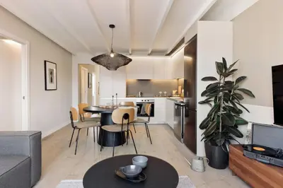 a bathroom with a toilet and a sink and a shower at Coipasa - 3 bedrooms and terrace in Eixample Dreta in Barcelona