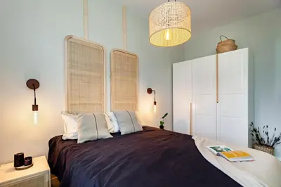 a home office with a desk and two chairs at Lidi - 2 bedrooms and balcony in Eixample Esquerra in Barcelona