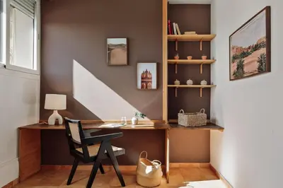 a dining room with a table and some chairs at Finnt - 1 bedroom and terrace in Eixample Dreta in Barcelona