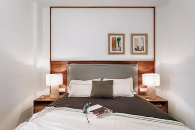 a living room with a large mirror on the wall at Pinar - 2 bedrooms and office in Eixample Esquerra in Barcelona