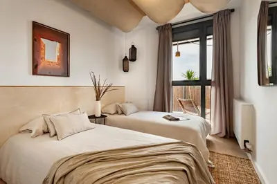 a balcony with a table and a bowl of fruit at Idir - 2 bedrooms, a pool and terrace in Poblenou in Barcelona