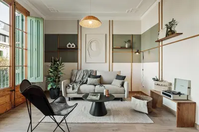 a living room with a couch and a table at Chixoy - 3 bedrooms and balcony in Eixample Dreta in Barcelona