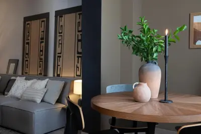 a living room with a gray couch and a table at Bara - 2 bedrooms in Eixample Dreta in Barcelona