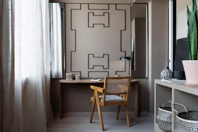 a table and chairs with a vase on top of it at Bara - 2 bedrooms in Eixample Dreta in Barcelona