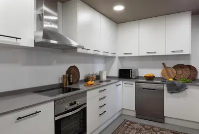 a living room with a couch and a tv at Anefis - 3 bedrooms and office in Gràcia in Barcelona