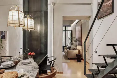 a living room with a couch and a table at Thar - 1 bedroom in Ciutat Vella in Barcelona
