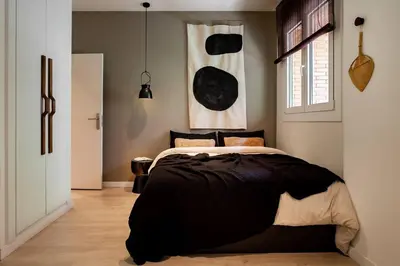 a bathroom with two sinks and a mirror at Rissani - 2 bedrooms in Sant Gervasi in Barcelona