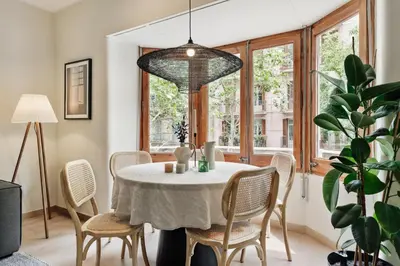 a bathroom with a white door and a sink at Izabal - 3 bedrooms and office in Eixample Esquerra in Barcelona