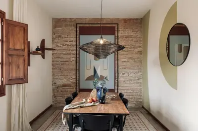 a white kitchen with white cabinets and a window at Marmara - 3 bedrooms and terrace in Sant Pere in Barcelona