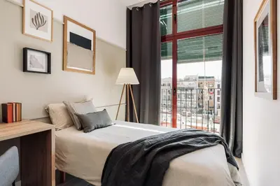 a living room with a couch and a table at Canadell - 2 bedrooms in Sant Antoni in Barcelona