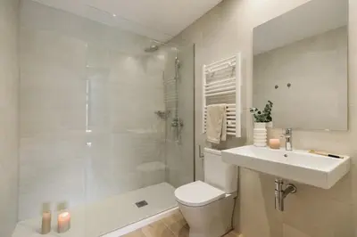 a bedroom with a bed and a large window at Canadell - 2 bedrooms in Sant Antoni in Barcelona
