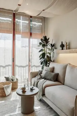 a living room with a couch and a table at Canadell - 2 bedrooms in Sant Antoni in Barcelona