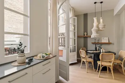 a living room with a couch and a table at Ixchel - 3 bedrooms, terrace and balcony in Gràcia in Barcelona