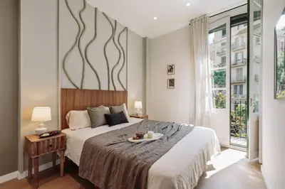 a living room with a couch and a table at Ixchel - 3 bedrooms, terrace and balcony in Gràcia in Barcelona