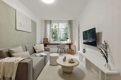 a bedroom with a large bed with a book on it at Drago - 3 bedrooms and balcony in Les Corts in Barcelona