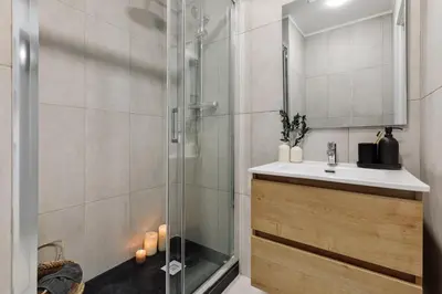 a bedroom with a bed with a book on it at Drago - 3 bedrooms and balcony in Les Corts in Barcelona