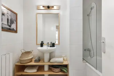 a bedroom with a bed and a desk and a chair at Gragnano - 2 bedrooms in Poblenou in Barcelona
