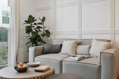 a living room with a couch and a table at Gragnano - 2 bedrooms in Poblenou in Barcelona