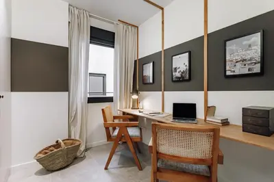 a kitchen and dining room with a table and chairs at Zubia - 2 bedrooms in Eixample Esquerra in Barcelona