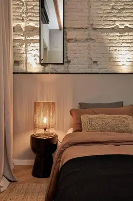 a bedroom with a bed and a mirror on the wall at Zuma - 1 bedroom and terrace in Eixample Esquerra in Barcelona