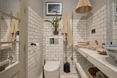 a bathroom with a sink and a mirror at Zuma - 1 bedroom and terrace in Eixample Esquerra in Barcelona