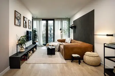 a bedroom with a bed and a balcony at Tokashi - 2 bedrooms and balcony in Eixample Dreta in Barcelona