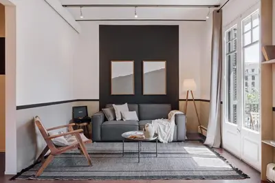 a small apartment with a bedroom and a bed at Moumour - 2 bedrooms in Eixample Dreta in Barcelona