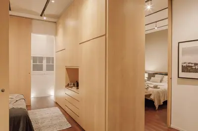 a kitchen with a large island in a room at Moumour - 2 bedrooms in Eixample Dreta in Barcelona