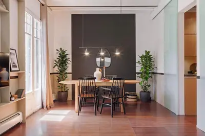 a dressing room with a mirror and a table at Moumour - 2 bedrooms in Eixample Dreta in Barcelona