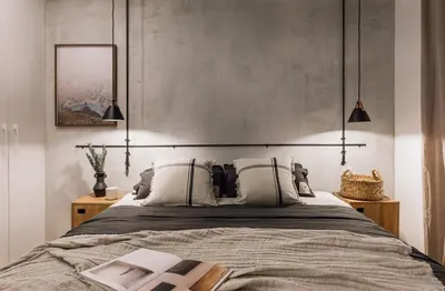 a bedroom with a bed and a picture on the wall at Cerler - 2 bedrooms and terrace in Sant Antoni in Barcelona