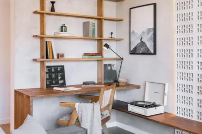 a home office with a desk and a chair at Cerler - 2 bedrooms and terrace in Sant Antoni in Barcelona