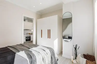 a living room with a couch and a table at Ona - 2 bedrooms in Sant Gervasi in Barcelona