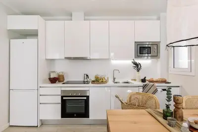 a living room with a couch and a table at Ona - 2 bedrooms in Sant Gervasi in Barcelona