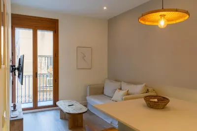 a living room with a couch and a table at 