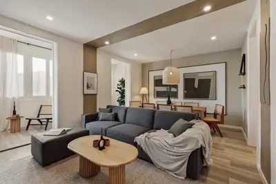 a bedroom with a bed and a window at Takalik - 4 bedrooms and office in l'Eixample Esq. in Barcelona