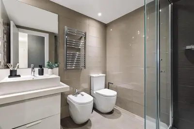 a kitchen with a sink and a counter with fruit on it at Paul - 2 bedrooms and pool in Poblenou in Barcelona
