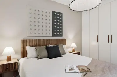 a living room with a table with a laptop on it at Paul - 2 bedrooms and pool in Poblenou in Barcelona