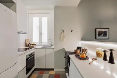 a room with a desk with a mirror and a chair at Pollock - 2 bedrooms and office in Eixample Dreta in Barcelona